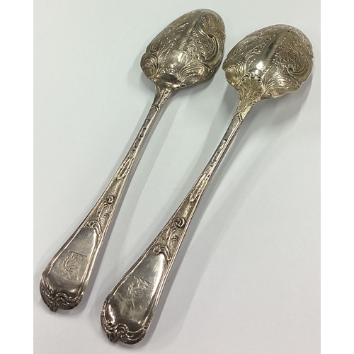 118 - A pair of 18th Century bottom marked silver spoons. Approx. 122 grams. Est. £100 - £150.