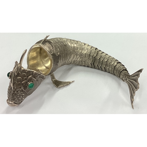 134 - A large Antique silver articulated fish hinged spice box with green eyes. Approx. 142 grams. Est. £2... 