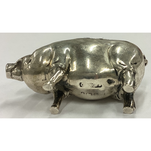 143 - A silver pin cushion in the form of a pig. Birmingham 1904. Approx. 42 grams. Est. £60 - £80.