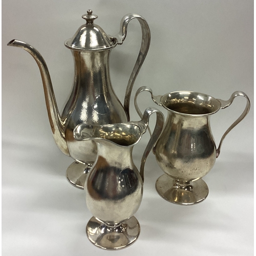 155 - An unusual Chinese silver three-piece tea set with hammered decoration. Marked to bases. Approx. 857... 