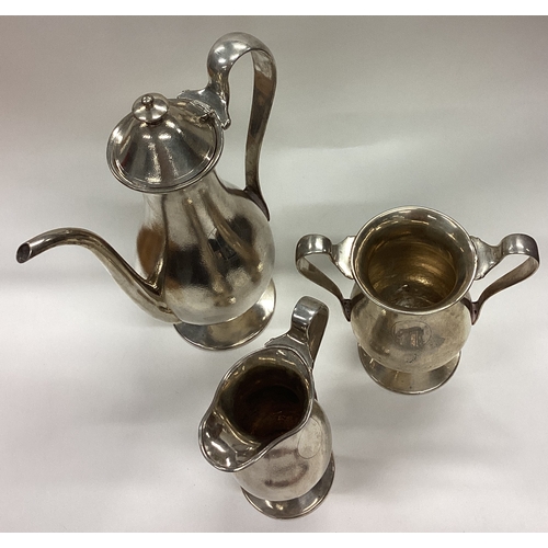 155 - An unusual Chinese silver three-piece tea set with hammered decoration. Marked to bases. Approx. 857... 