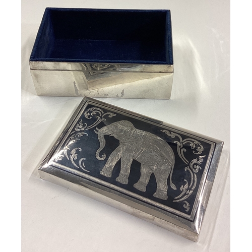 16 - A silver and Niello jewellery box with lift-off cover and elephant decoration. Marked to base. Appro... 