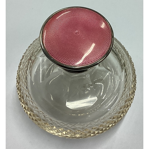 181 - A silver, pink enamelled and glass scent bottle. Birmingham 1932. Est. £60 - £80.