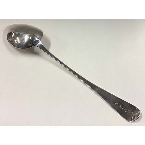 196 - A large George III silver basting spoon. London 1825. By John Henry & Charles Lias. Approx. 110 gram... 