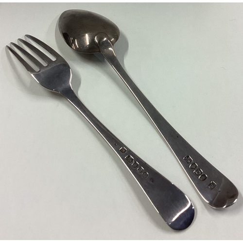 199 - A cased George III silver feather edge christening spoon and fork. London 1801. Approx. 70 grams. Es... 