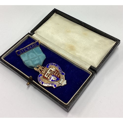 206 - A cased silver and enamelled Royal Masonic medallion. Birmingham 1937. By Spencer London. Approx. 32... 