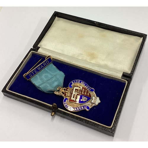 206 - A cased silver and enamelled Royal Masonic medallion. Birmingham 1937. By Spencer London. Approx. 32... 