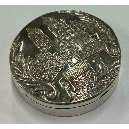 207 - An unusual Sterling silver hinged pill box with castle scene to front. Approx. 22 grams. Est. £20 - ... 