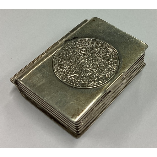 208 - A Sterling silver pill box with hinged cover in the form of a book. Approx. 17 grams. Est. £20 - £30... 