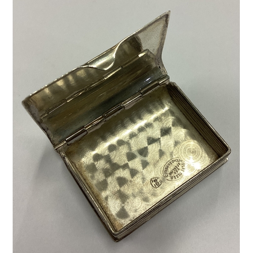 208 - A Sterling silver pill box with hinged cover in the form of a book. Approx. 17 grams. Est. £20 - £30... 