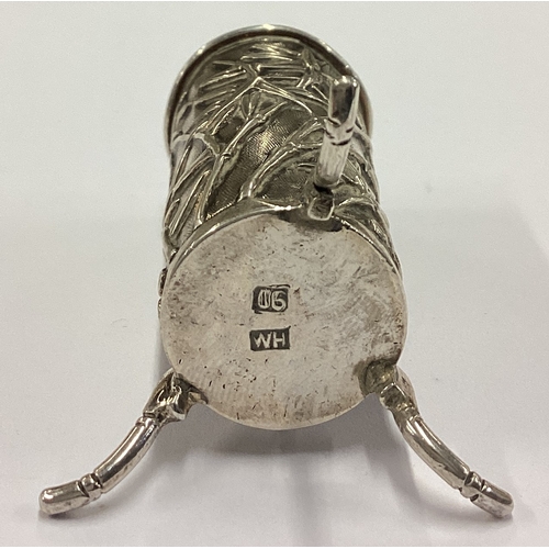 210 - WANG HING: A Chinese silver toy vase chased with bamboo decoration. Marked to base. Approx. 14 grams... 