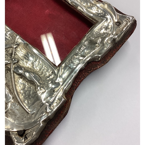 228 - A novelty silver frame chased with farming scene. Birmingham 1905. Approx. 83 grams of gross weight.... 