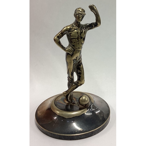 238 - A silver plated football trophy. Est. £30 - £40.