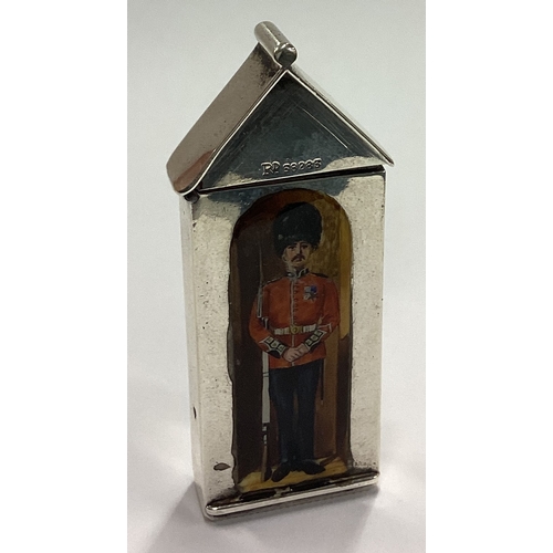 241 - A rare novelty Victorian silver Queen's Guard vesta case, the face enamelled with a Grenadier Guards... 