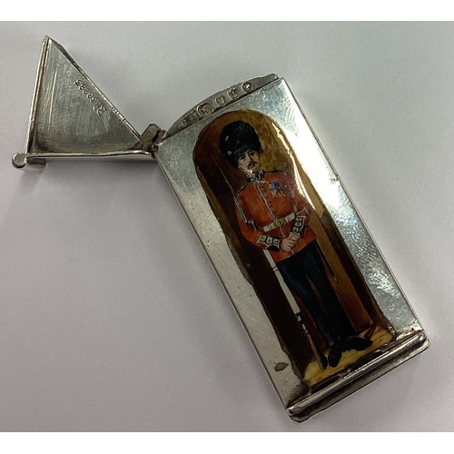 241 - A rare novelty Victorian silver Queen's Guard vesta case, the face enamelled with a Grenadier Guards... 