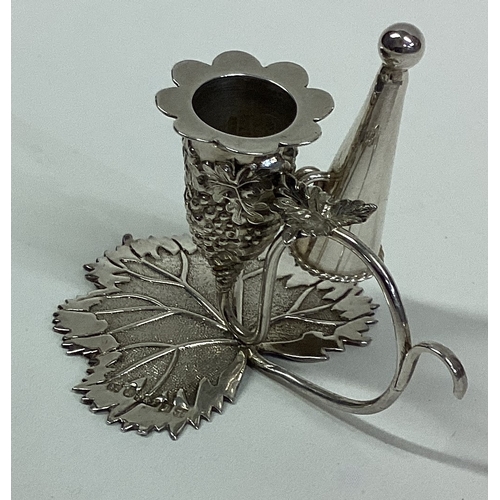 258 - An attractive miniature Victorian cast silver chamberstick with frosted decoration together with ext... 