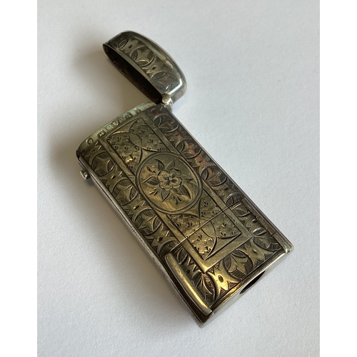 319 - A silver combination vesta / match case. Birmingham 1868. By George Unite. Approx. 23 grams. Est. £8... 