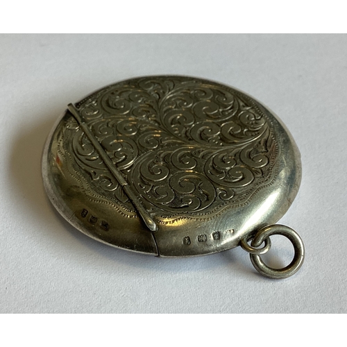 322 - An unusual round silver vesta case. Birmingham 1905. Approx. 28 grams. Est. £50 - £80.