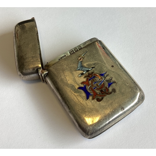 365 - A silver and enamelled vesta case with central armorial. London 1897.  Approx. 46 grams. Est. £120 -... 