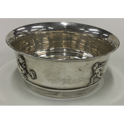 373 - A silver christening bowl with chased decoration. Birmingham 1923. Approx. 129 grams. Est. £120 - £1... 