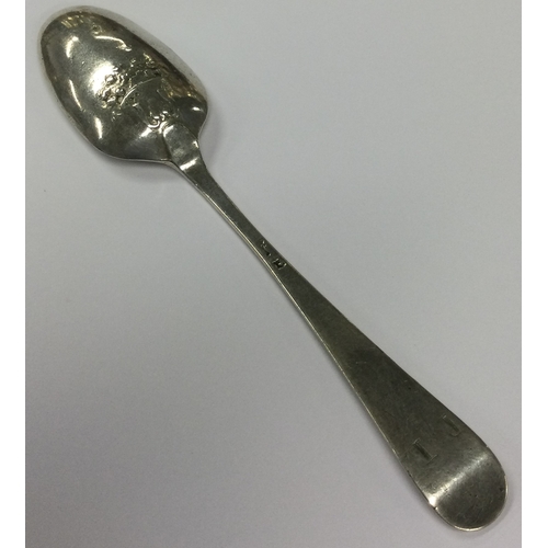 381 - An early Georgian silver picture back spoon chased with basket of flowers. Marked with lion only. Ci... 