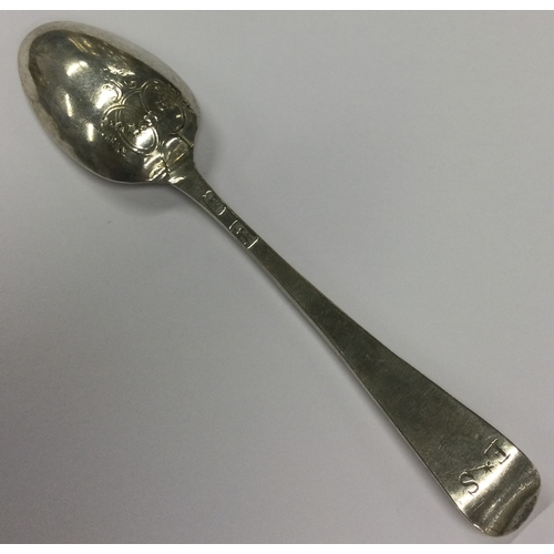 382 - An early 18th Century Georgian silver picture back spoon with chased decoration. Circa 1770. Approx.... 