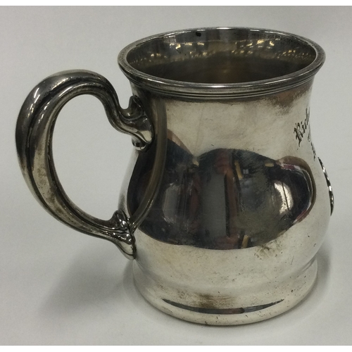 386 - A silver and enamelled mug embossed with American and Australian flags. Marked Sterling to base. App... 