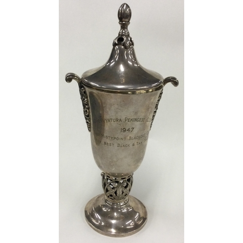 405 - A rare Art Nouveau silver trophy with pierced foot. Birmingham 1928. Approx. 322 grams. Est. £300 - ... 