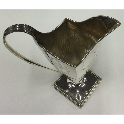 420 - An unusual shaped silver jug with beaded decoration. London 1786. By Robert Hennell. Est. £150 - £20... 