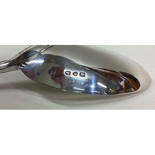 422 - A heavy silver Albany pattern basting spoon. London. By CP. Approx. 215 grams. Est. £100 - £150.