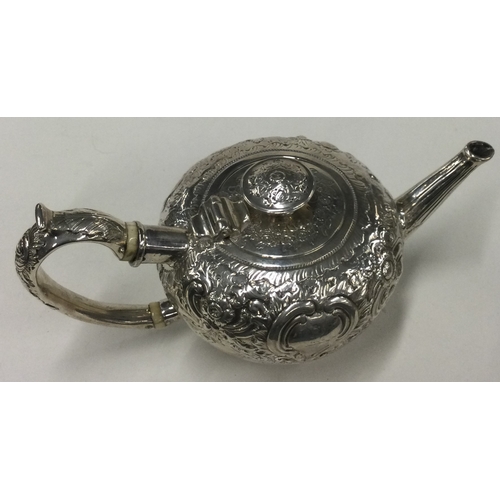 431 - An 18th Century silver bullet shaped teapot with chased decoration. Approx. 327 grams. Est. £300 - £... 