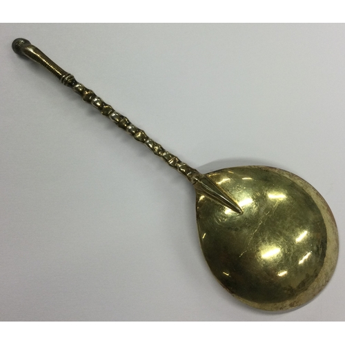 443 - An early Continental silver gilt spoon with hoof finial. Approx. 49 grams. Est. £40 - £60.