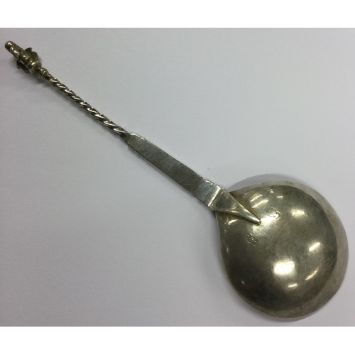 444 - An early Antique Continental silver spoon with crest finial. Approx. 55 grams. Est. £50 - £80.