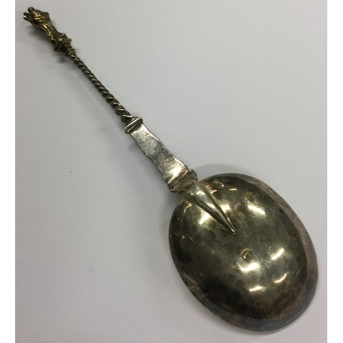 445 - An early silver Apostle top spoon. Marked to back. Approx. 50 grams. Est. £50 - £80.