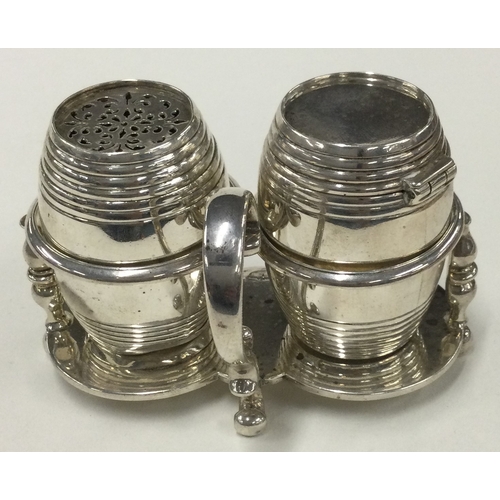 448 - A Victorian silver cruet set. London 1877. By George Smith. Approx. 199 grams. Est. £150 - £200.