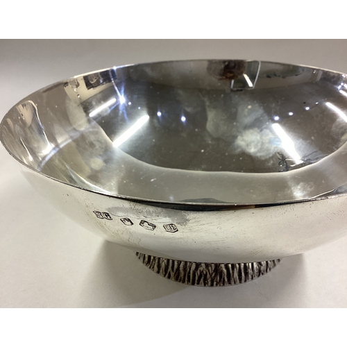 457 - A fine silver bowl with bark decoration to base. Sheffield 1973. By SG. Approx. 307 grams. Est. £200... 