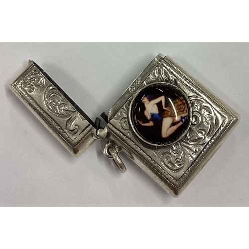 465 - A silver vesta case with enamelled plaque to centre. Marked 925. Approx. 18 grams. Est. £20 - £30.