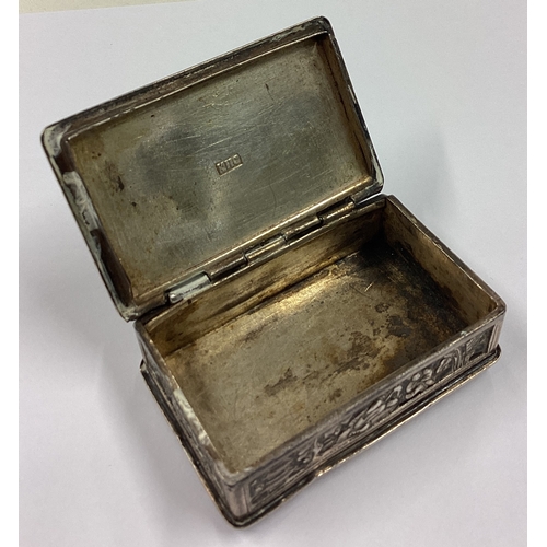 466 - A Chinese silver box with figural decoration. Marked KHC. Approx. 90 grams. Est. £80 - £120.