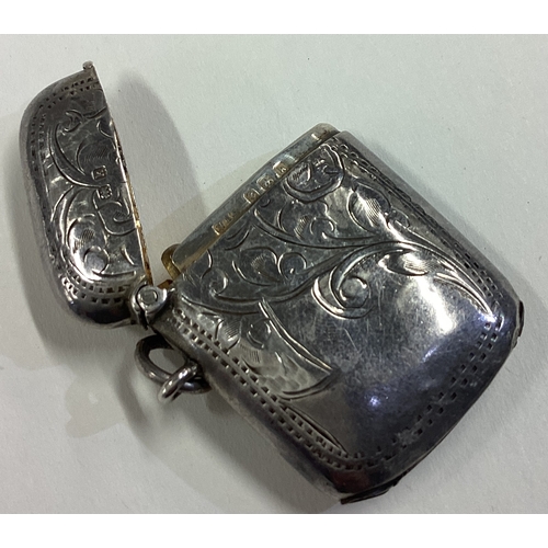 47 - A silver vesta case with engraved decoration. 1915. By HWL Ltd. Approx. 17 grams. Est. £20 - £30.