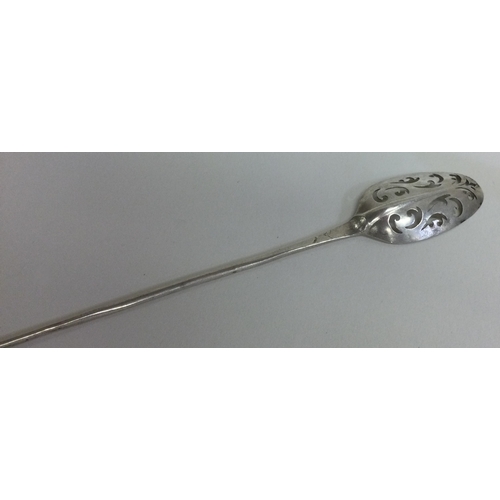 476 - A large silver rat tail mote spoon with pierced decoration. Approx. 7 grams. Est. £50 - £80.