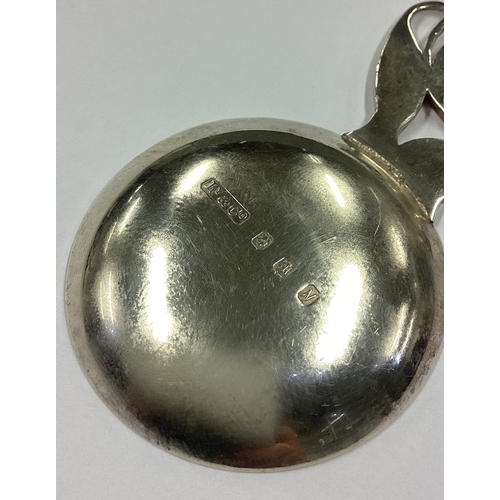 479 - LIBERTY & CO: A silver and enamelled caddy spoon retailed in Regent Street W1. Edinburgh 1987. Appro... 