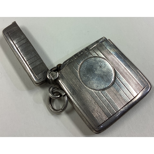 49 - A silver vesta case. Birmingham 1909. By WH. Approx. 17 grams. Est. £20 - £30.