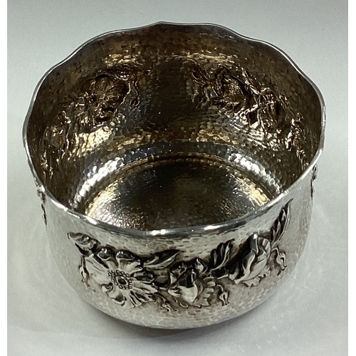 499 - CHESTER: A fine Art Nouveau chased silver bowl embossed with floral decoration. 1908. By George Nath... 