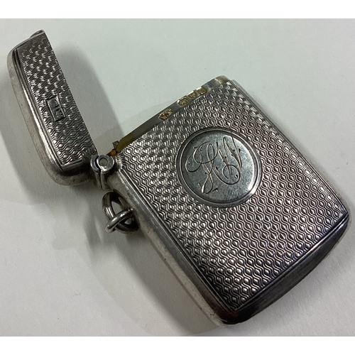 50 - CHESTER: An ornate silver engine turned vesta case. 1904. By William Neale. Approx. 26 grams. Est. £... 