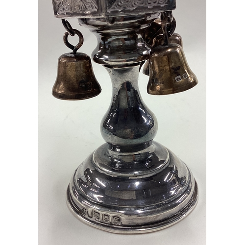 508 - A chased Judaica silver spice box with bells. London 1972. Approx. 137 grams. Est. £200 - £300.