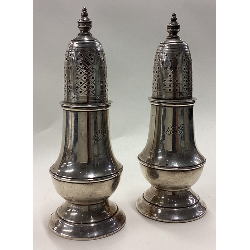 509 - TIFFANY & CO: A pair of silver sugar caster. Fully marked to bases. Approx. 264 grams. Est. £250 - £... 