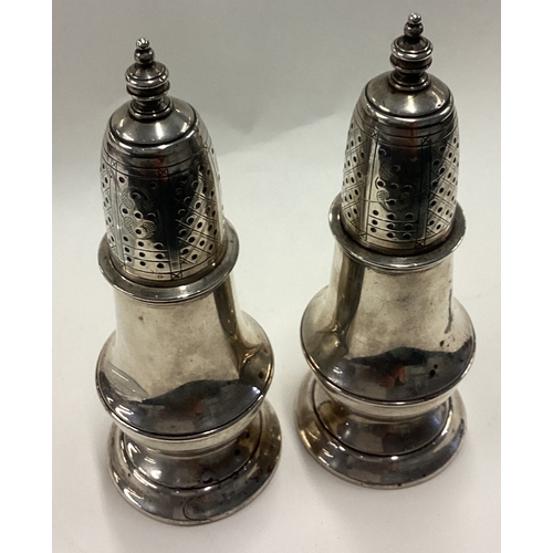 509 - TIFFANY & CO: A pair of silver sugar caster. Fully marked to bases. Approx. 264 grams. Est. £250 - £... 