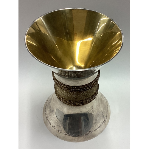 525 - A large silver double goblet with gilt hammered decoration. London 1974. By MCA. Approx. 650 grams. ... 