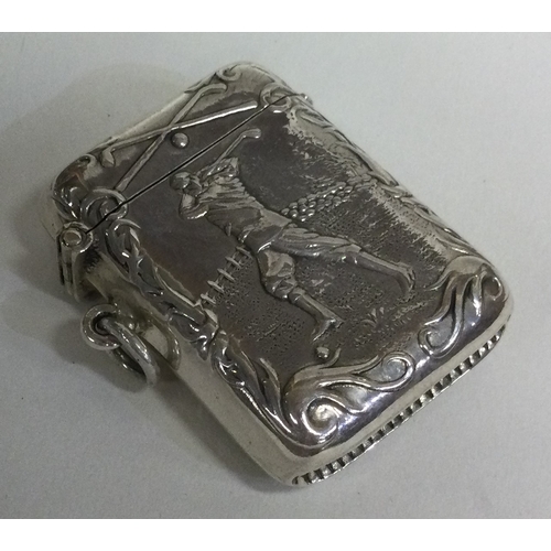 533 - OF GOLFING INTEREST: An American silver vesta case with chased golfing scene. Approx. 25 grams. Est.... 