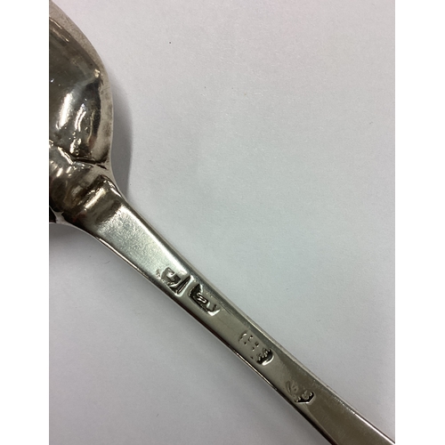 552 - An 18th Century silver bottom marked rat tail spoon decorated with rare animal crest to centre. Lond... 